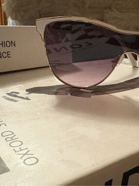 Nanette Lepore Sunglasses with a Beautiful White and Gold Frame